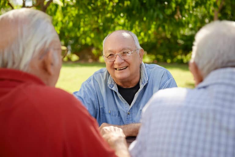 Barton House Memory Care | Senior men socializing