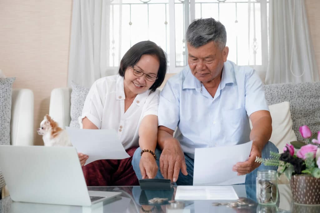 Barton House Memory Care | Senior couple going through financials