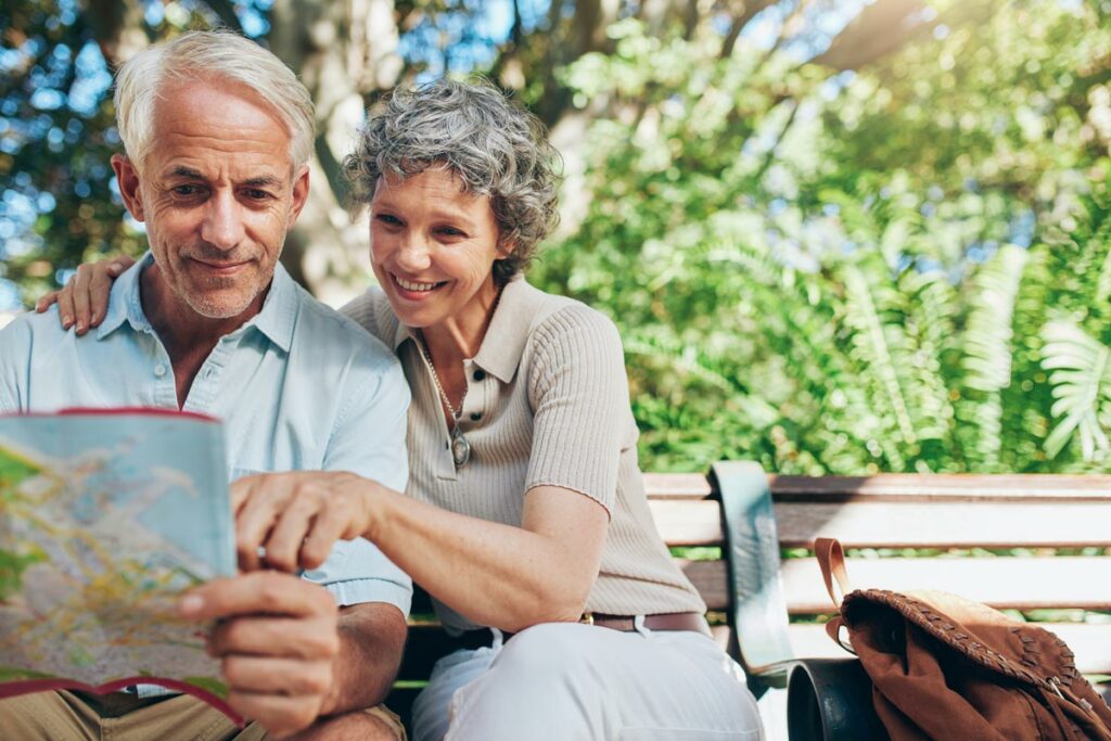 Orangeburg Memory Care | Senior couple pointing at map