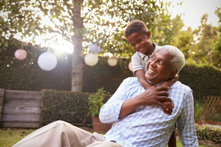 Orangeburg Memory Care | Senior man and his grandson