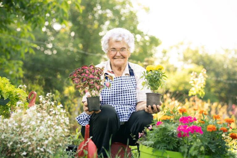 Orangeburg Memory Care | Senior woman gardening