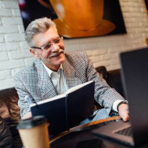 Stockton Assisted Living | Senior man using a laptop