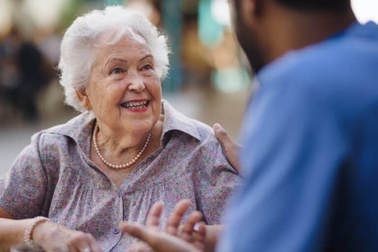 Stockton Assisted Living | Senior woman and caregiver talking