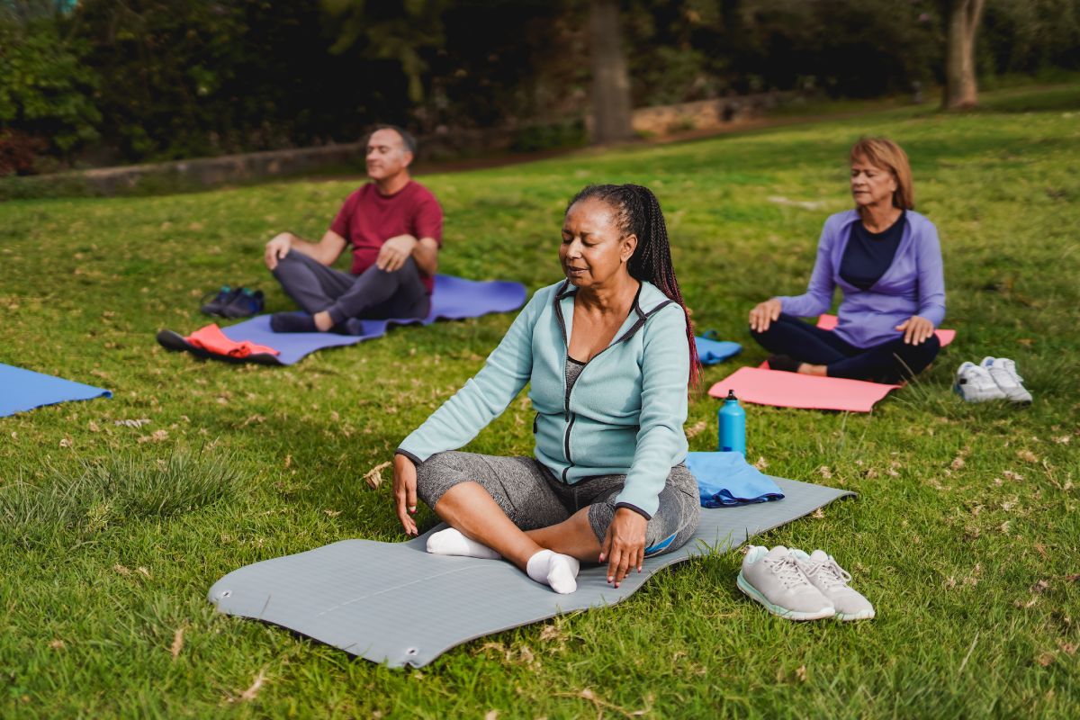 Stockton Assisted Living | Group of seniors stretching outside